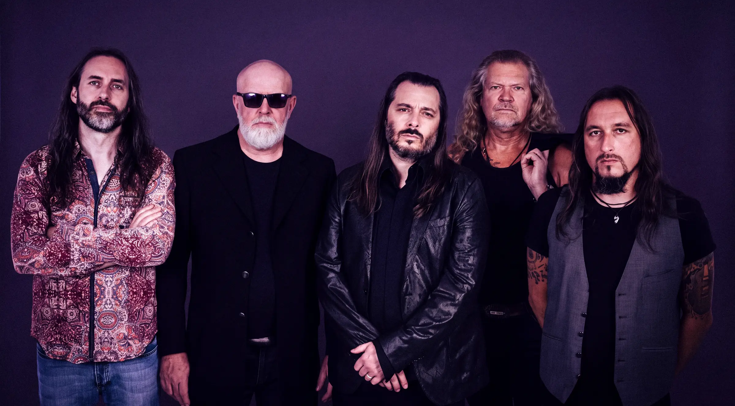Rook Road band photo in purple light